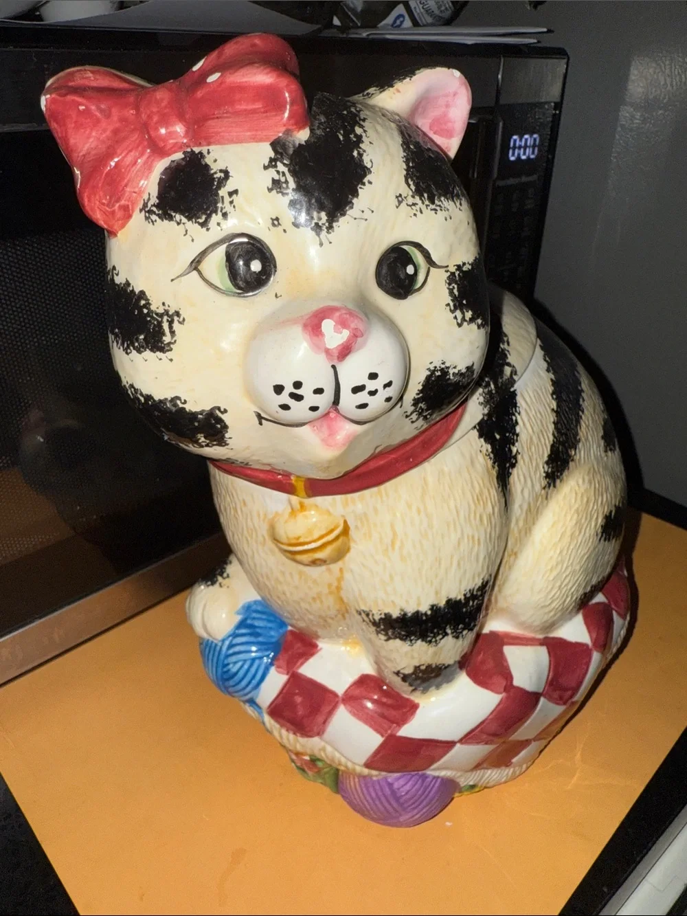Ceramic Black & White Striped Cat Figurine with Red Bow